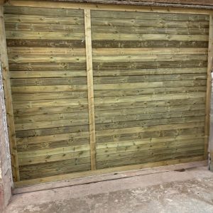 Front view of Linnells Noise Reflect Grooved acoustic fencing.