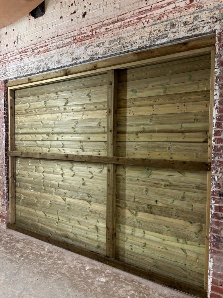 Rear view of Linnells Noise Reflect Grooved acoustic fencing.